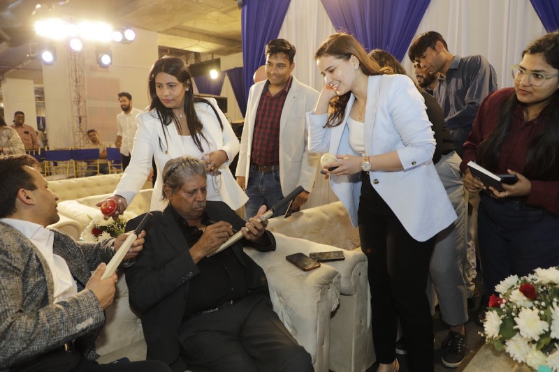 Getting Bats Signed by Celebrity Kapil Dev at SEW Event in Noida by SOS Party gallery image