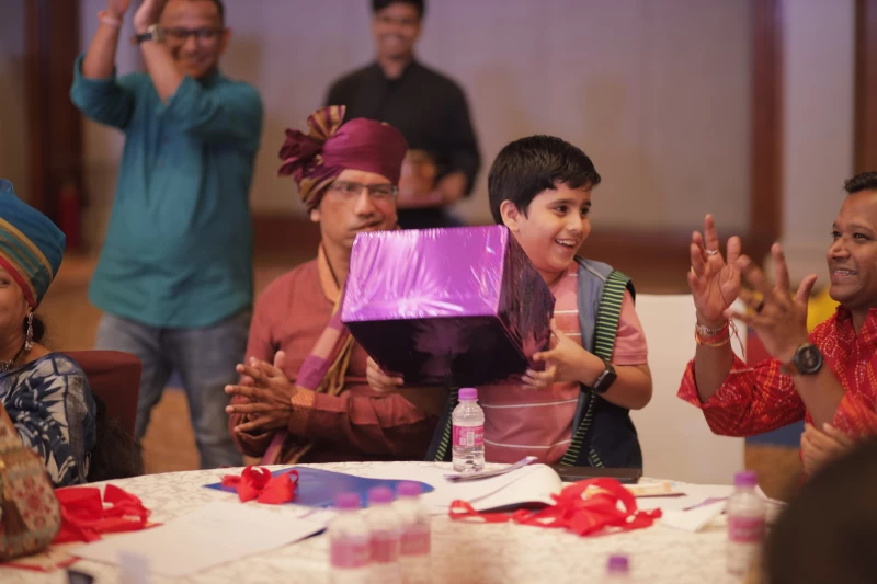 Children receiving gifts at Family Day Celebration gallery image Children receiving gifts at Family Day Celebration gallery image