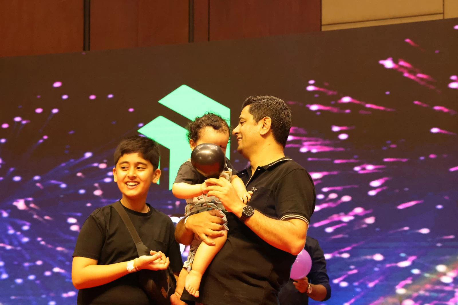 Sibling Fun at Family Day Celebration gallery image